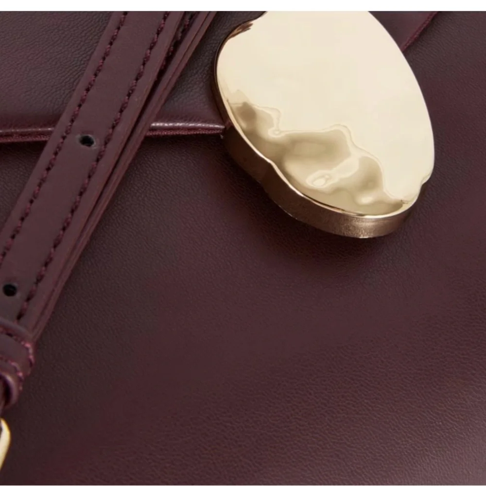 Elegant Burgundy Clutch with Gold Accent - Picture 4 of 5